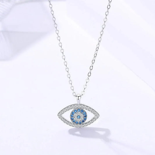 Evil eye necklace with blue crystals and silver chain, spiritual protection jewelry
