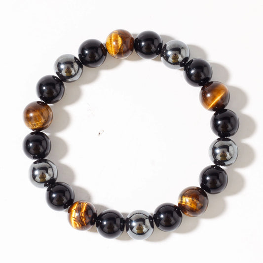 Bracelet with black, brown, and silver beads on a white background