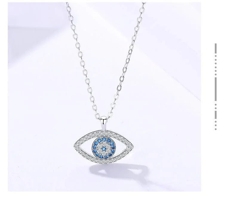 Evil eye necklace with blue crystals and silver chain, spiritual protection jewelry for everyday wear
