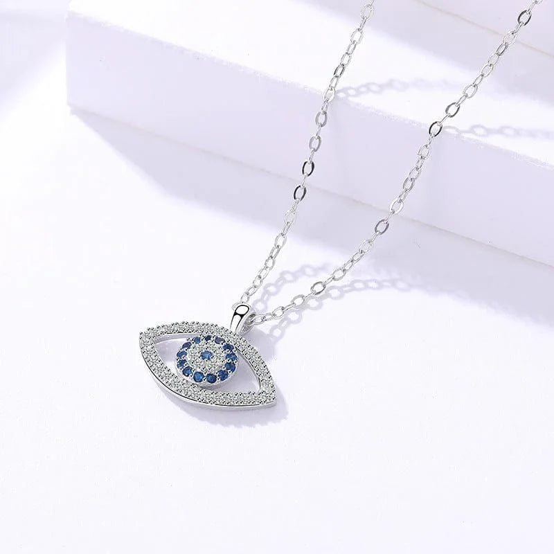 Evil eye necklace with blue crystals and silver chain, spiritual protection jewelry