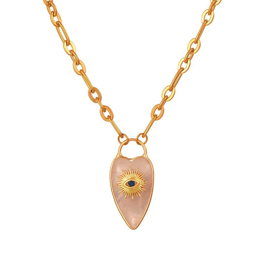 Pink crystal heart pendant necklace with evil eye charm