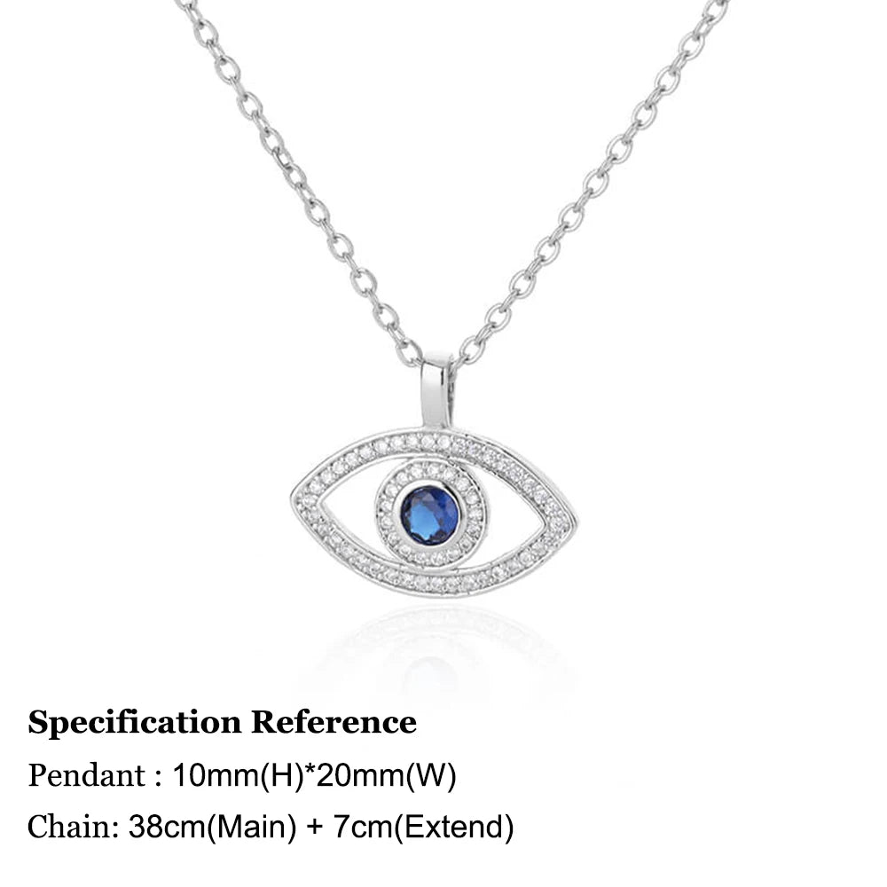 Silver necklace with eye-shaped pendant featuring a blue gemstone on a white background
