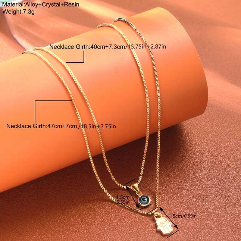 Women wearing double layer evil eye necklace elegant party jewelry look