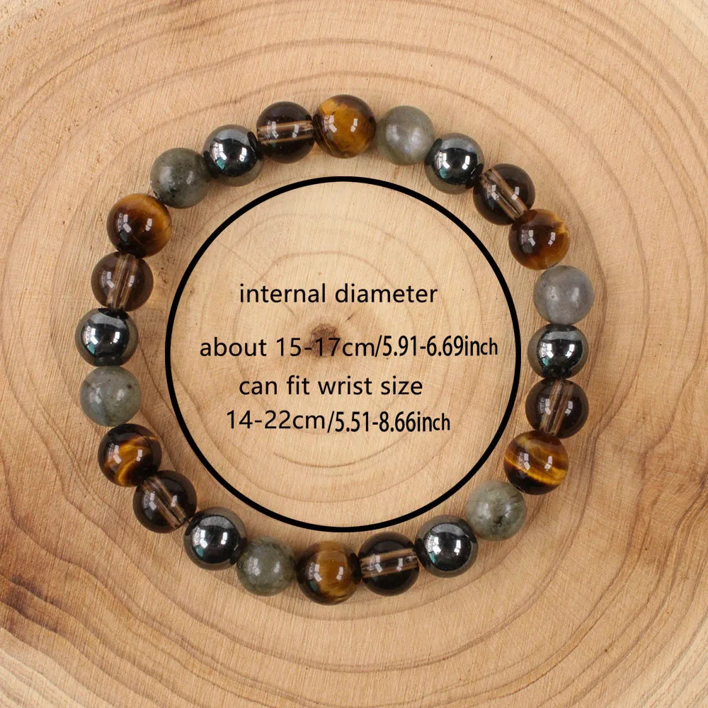 Multicolored beaded bracelet on a wooden surface with size information.